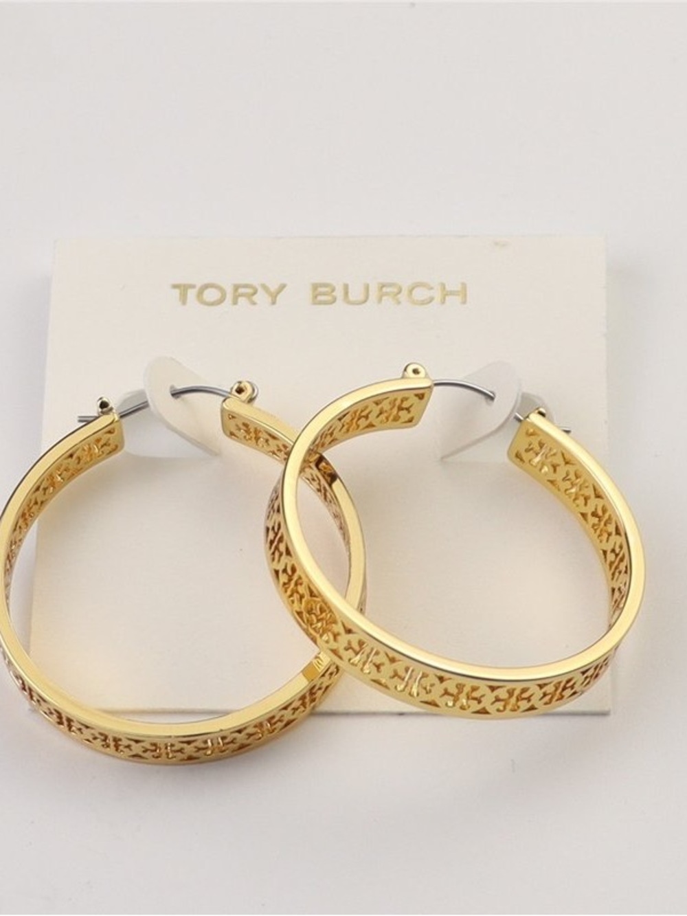 Tory Burch Gold Filigree Hoop Earrings — Signature Cutout Design